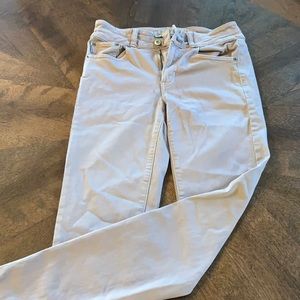 Dusty pink skinny jeans